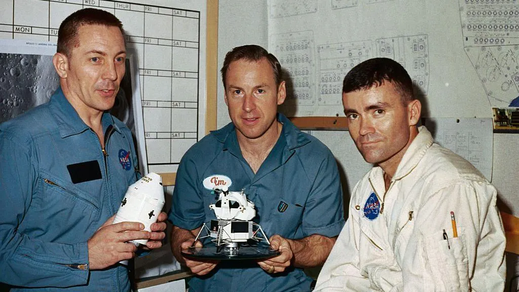 The crew of the ill-fated Apollo 13: Jack Swigert, Jim Lovell and Fred Haise. They are holding models of the craft