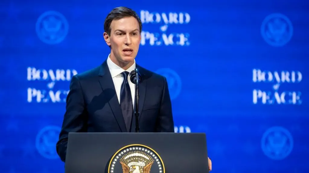 Jared Kushner speaking on stage from behind a podium