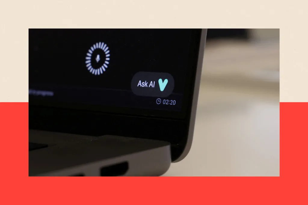 A laptop screen shows an interaction with an AI chatbot 