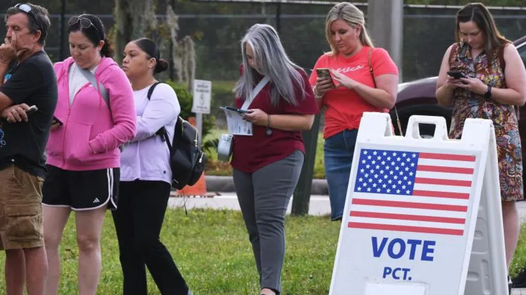 Voters queue-up outside a polling station in Florida