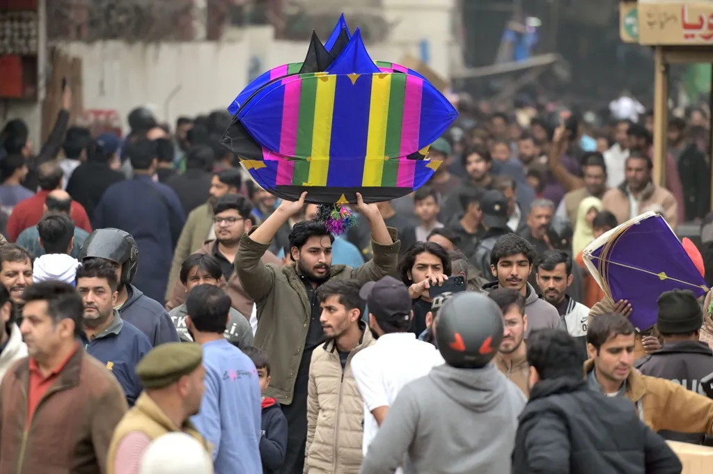 People rush to buy kites and stringers as the authorities officially start sales for the upcoming spring Basant festival in Lahore, Pakistan, 01 February 2026. 