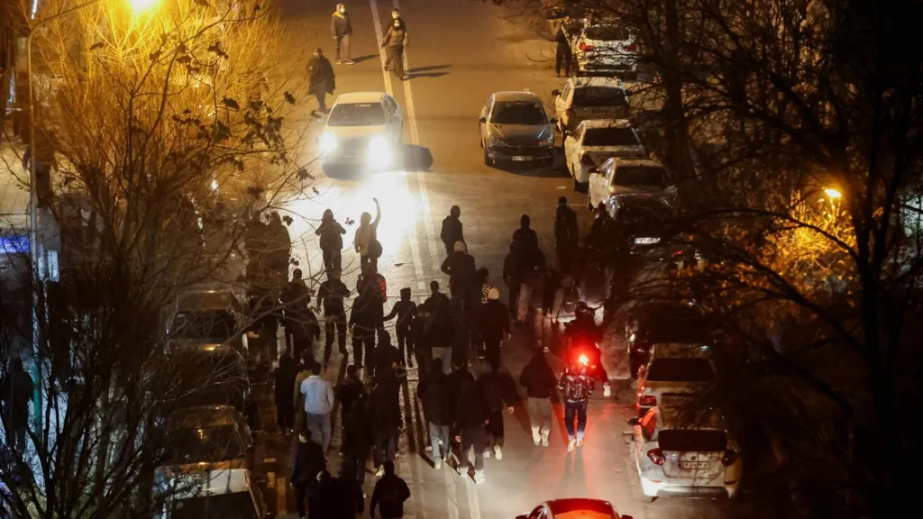 Iranians protest on a street in Tehran, Iran (8 January 2026)