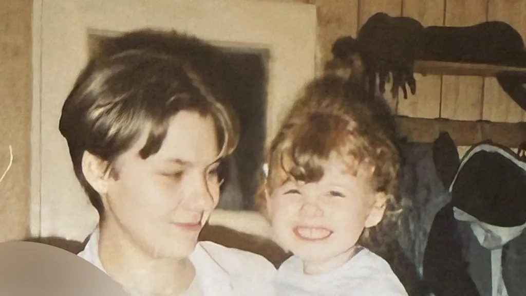 Izabela looks at her daughter, Kasia.