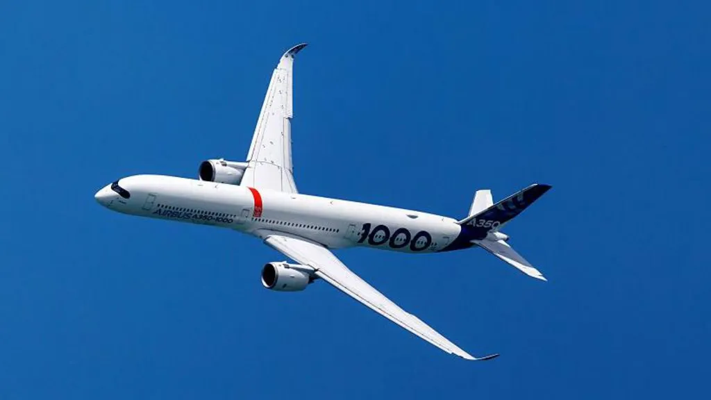 An Airbus SE A350-1000 aircraft performs during a flying display at the Singapore Airshow in Singapore