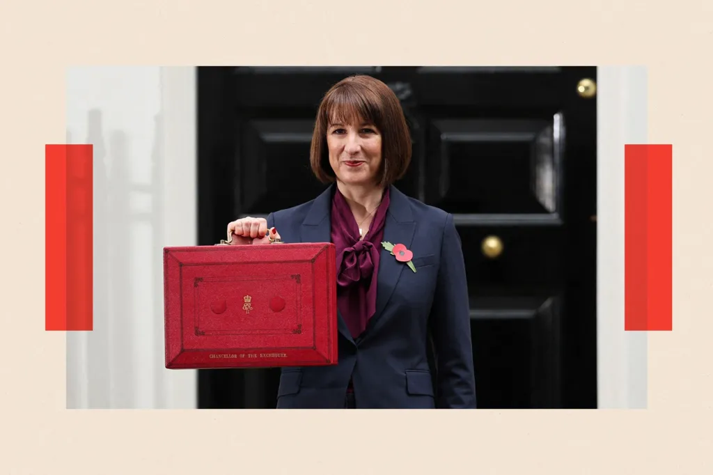 Britain's Chancellor of the Exchequer Rachel Reeves poses with the red Budget Box as she leaves 11 Downing Street

