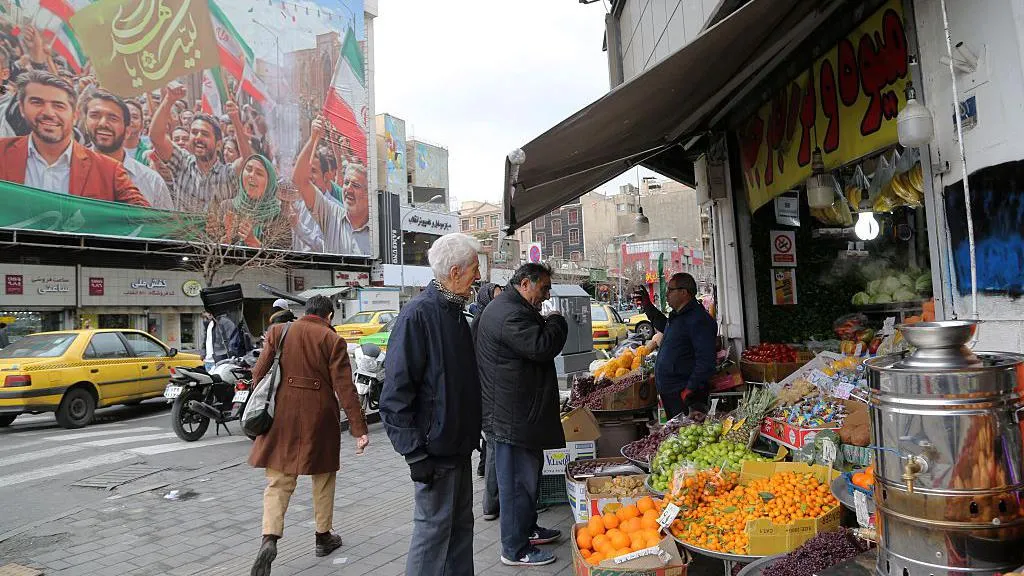 People shop in Enghalab Square, Tehran, Iran (9 February 2026)