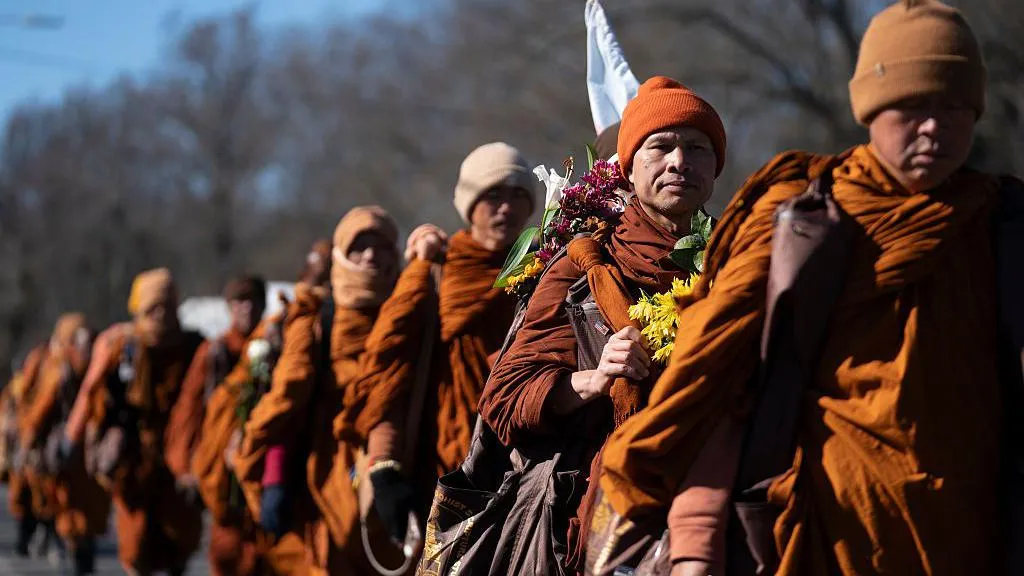 Buddhist monks seen walking on their trek from Fort Worth, Texas to Washington DC
