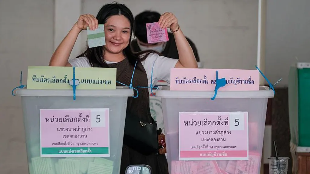 Voters cast their ballots at a polling station during Thailand's general election in Bangkok, Thailand.