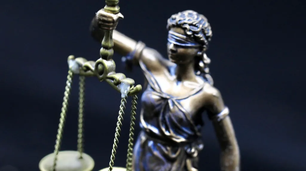 A statue of Greek Lady Justice holding scales