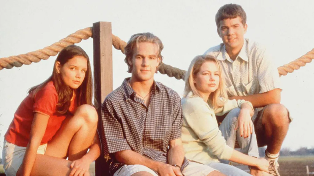 The cast of Dawson's Creek from left to right are Katie Holmes, James Van Der Beek, Michelle Williams, and Joshua Jackson.