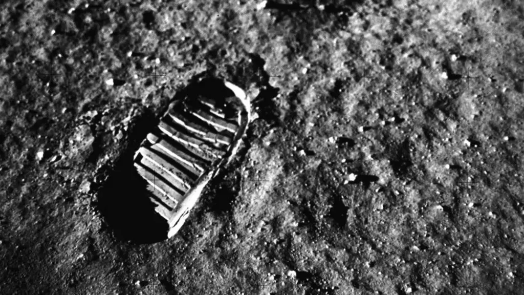 Black and white photograph of an astronaut’s footprint in the lunar soil taken during the Apollo 11 mission