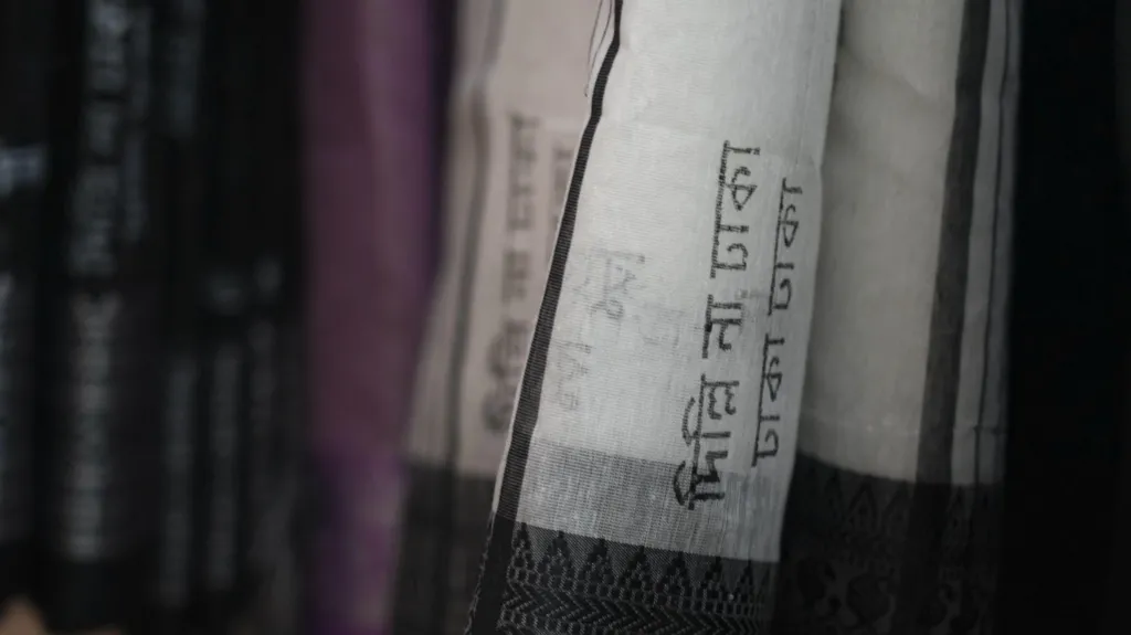 "Dhaka, not Delhi" is a slogan stitched onto saris, a traditional dress for women in Bangladesh and India