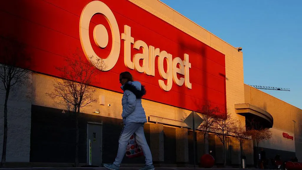 The sun sets on a Target corporate logo sign outside their retail store on January 1, 2026, in Jersey City, New Jersey. 