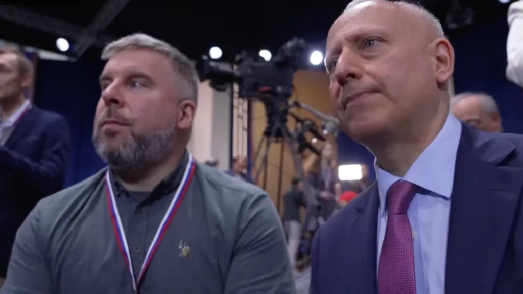 The BBC's Ben Tavener and Steve Rosenberg are seen in a close-up shot at Vladimir Putin's end of 2025 press conference.