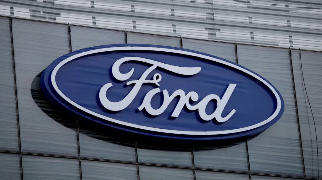 The blue Ford oval logo is displayed on the new Ford World Headquarters in Dearborn, Michigan, U.S. November 16, 2025.